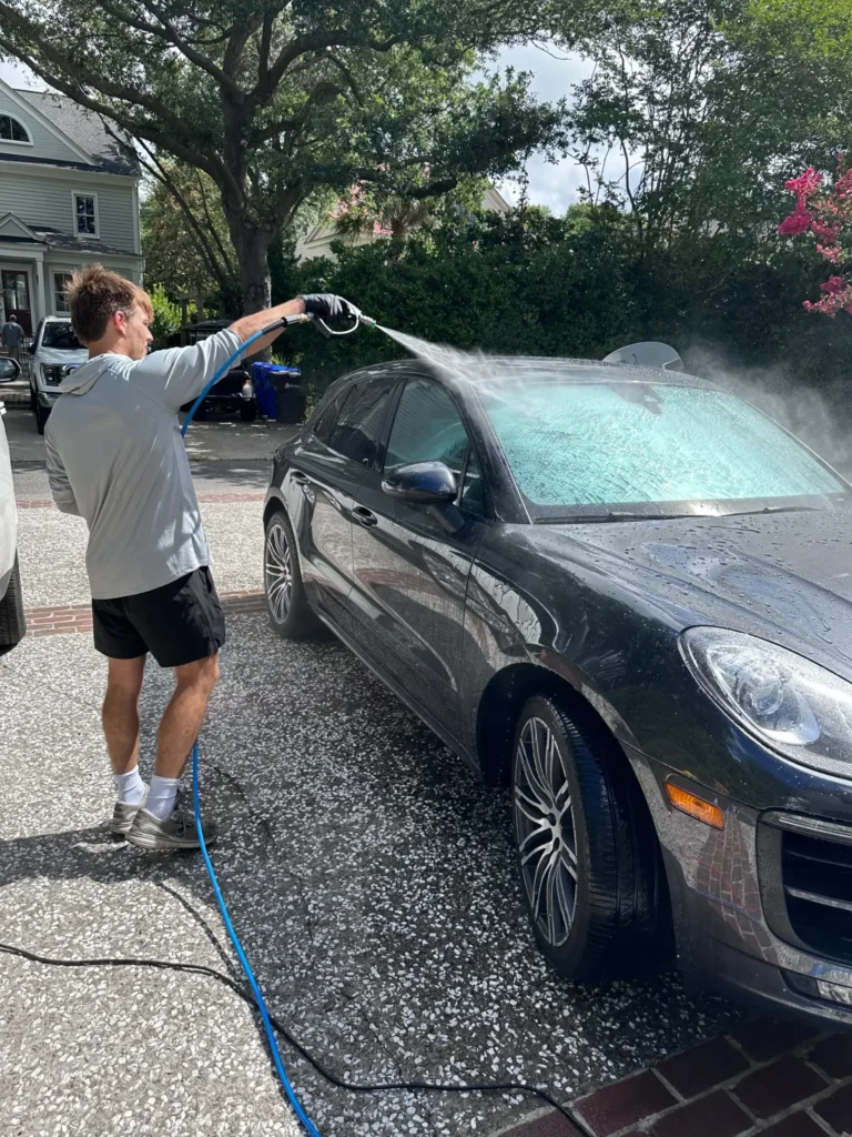 Hand washing a Porsche Cayenne