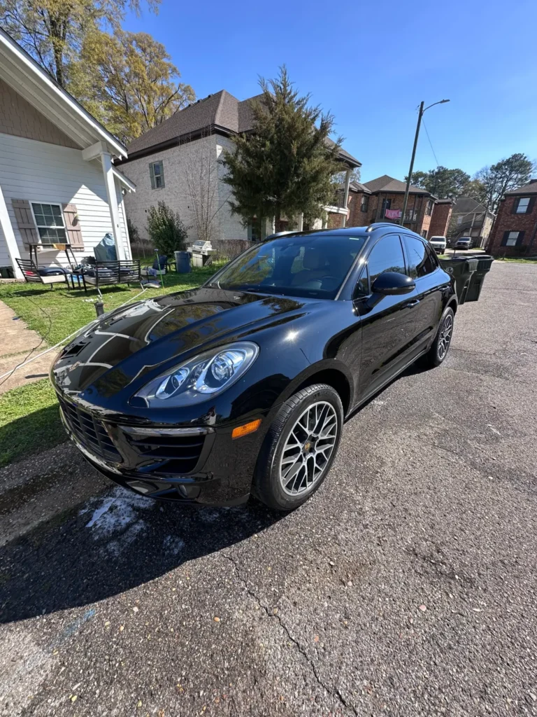 Black Porsche Cayenne after exterior detailing