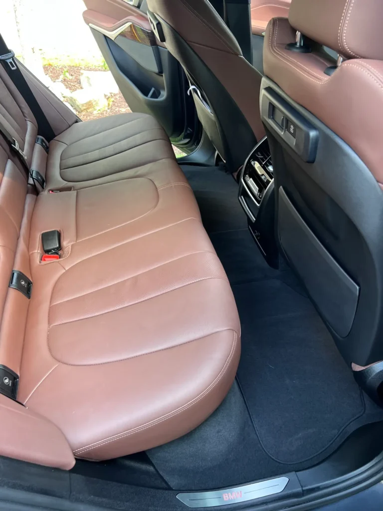 Brown leather rear seats after interior detailing