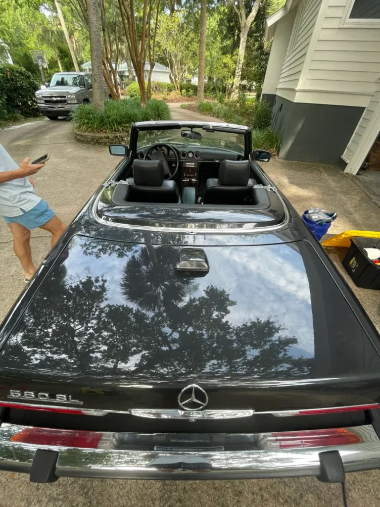Classic Mercedes-Benz SL convertible, top down, detailed